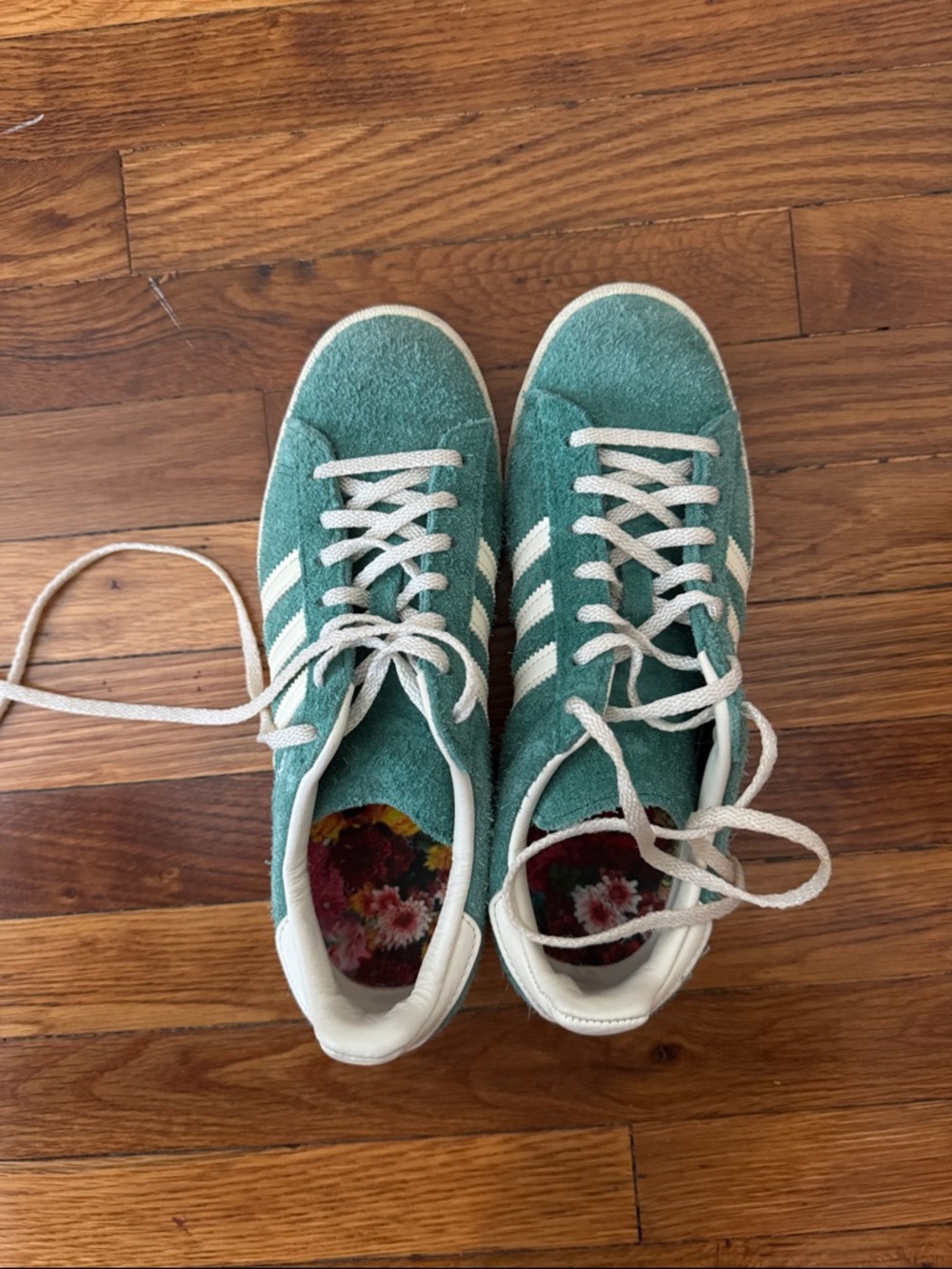 Green suede adidas campus sneakers
